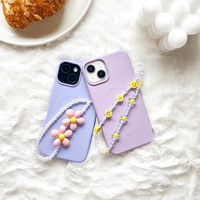 Oscar Daisy Smiley Pearl Phone Charm